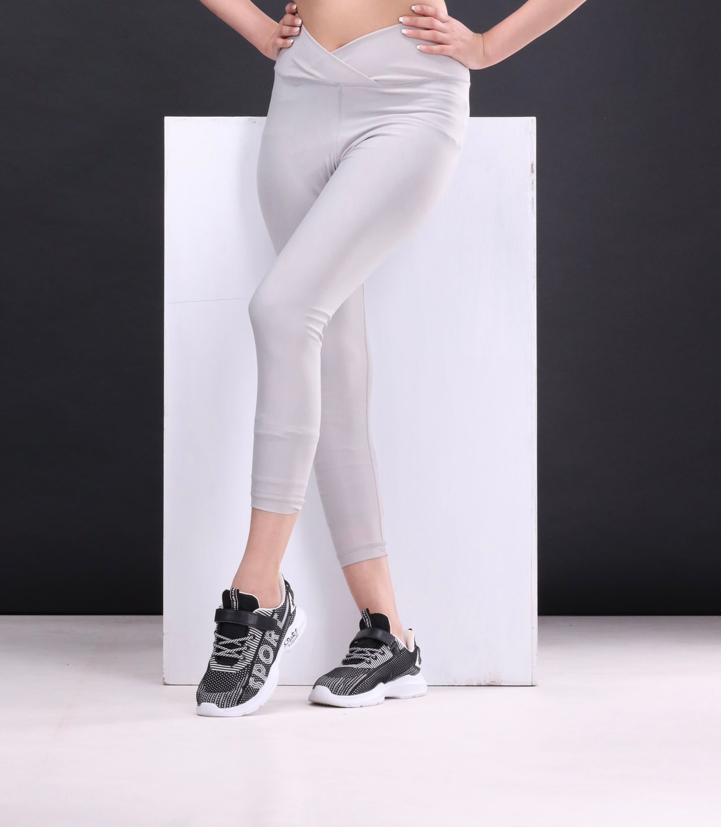 Grey sports bra and leggings