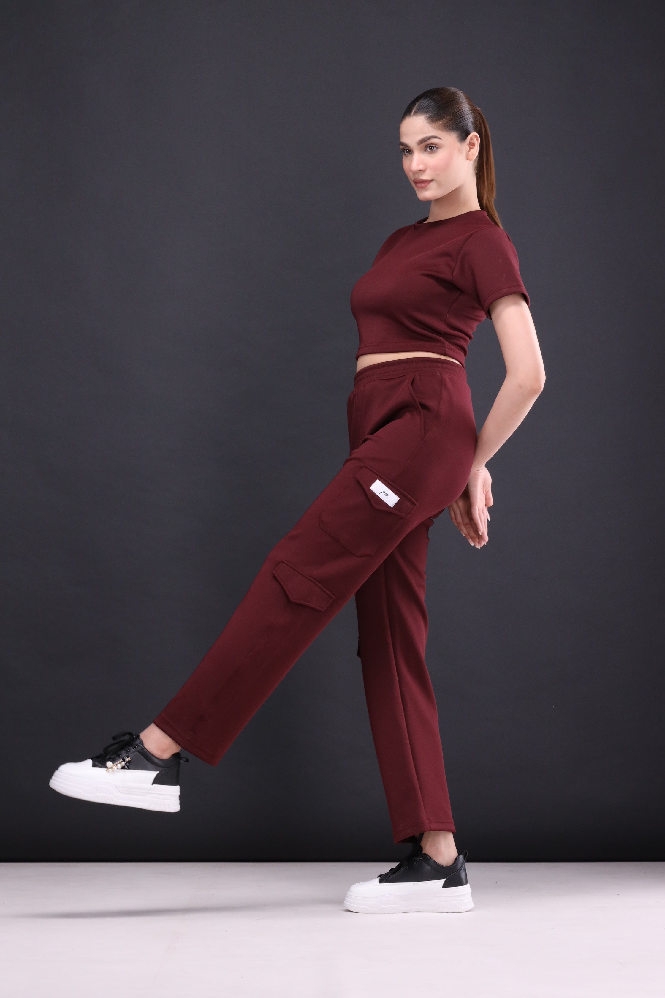 Maroon crop tee and cargo pants