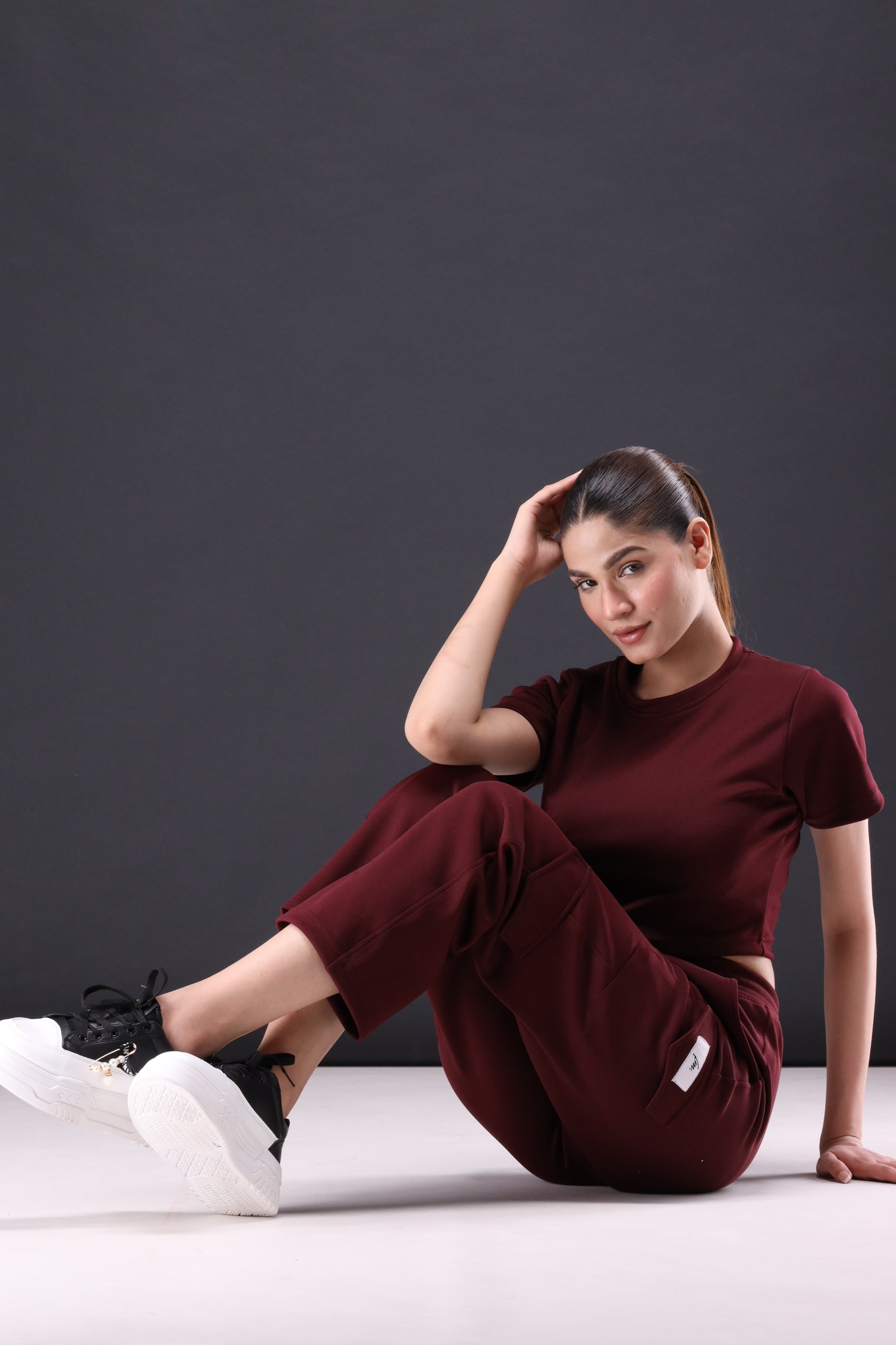 Maroon crop tee and cargo pants