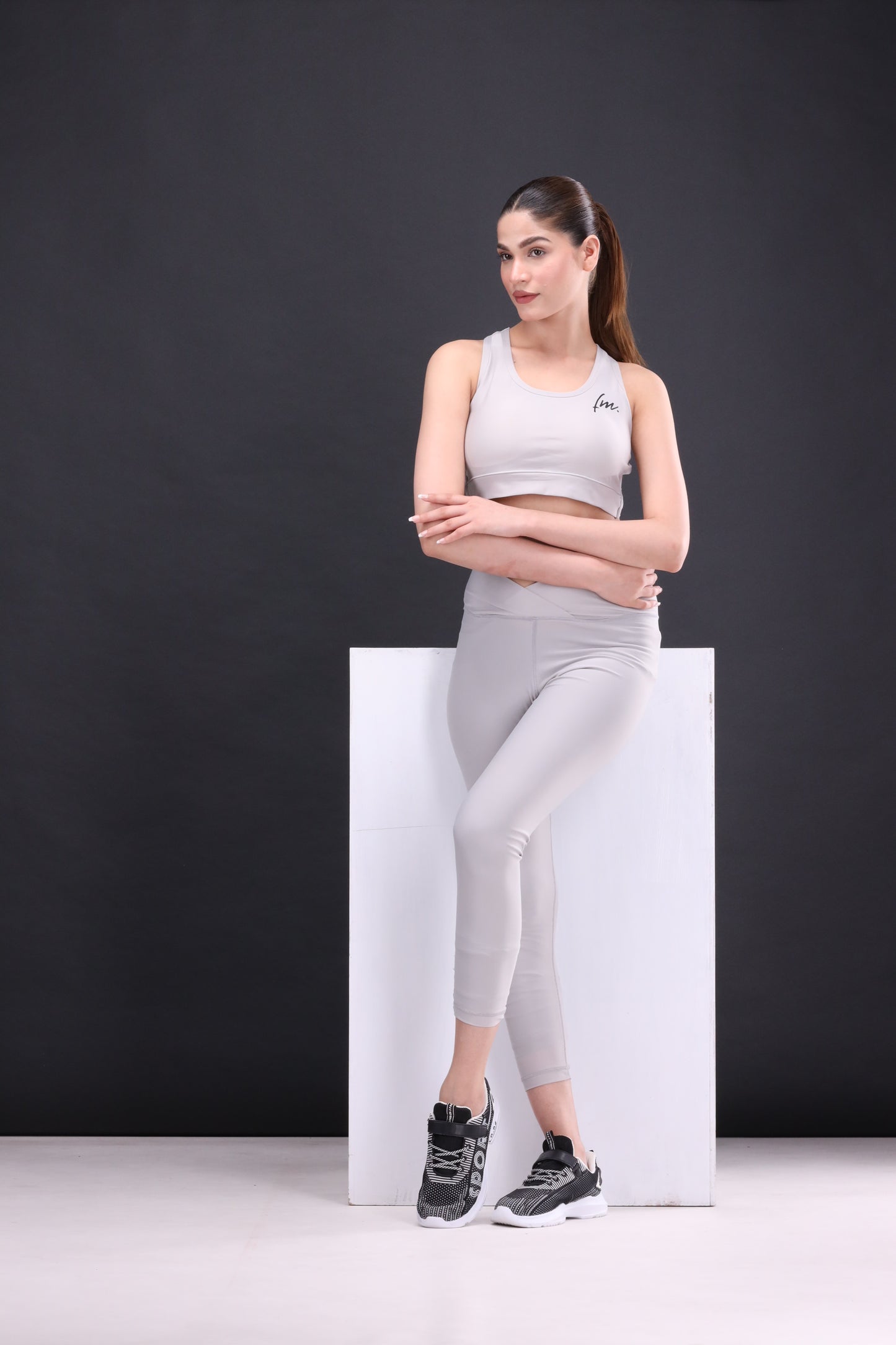 Grey sports bra and leggings