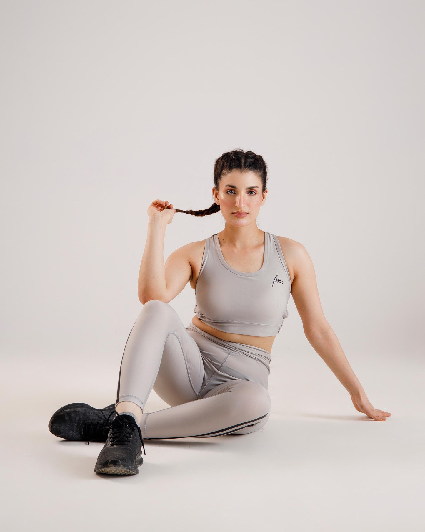 Light grey sports bra and legging